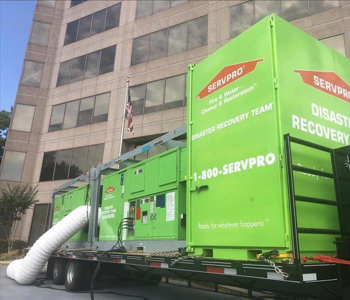 SERVPRO drying equipment setup out front of a commercial loss